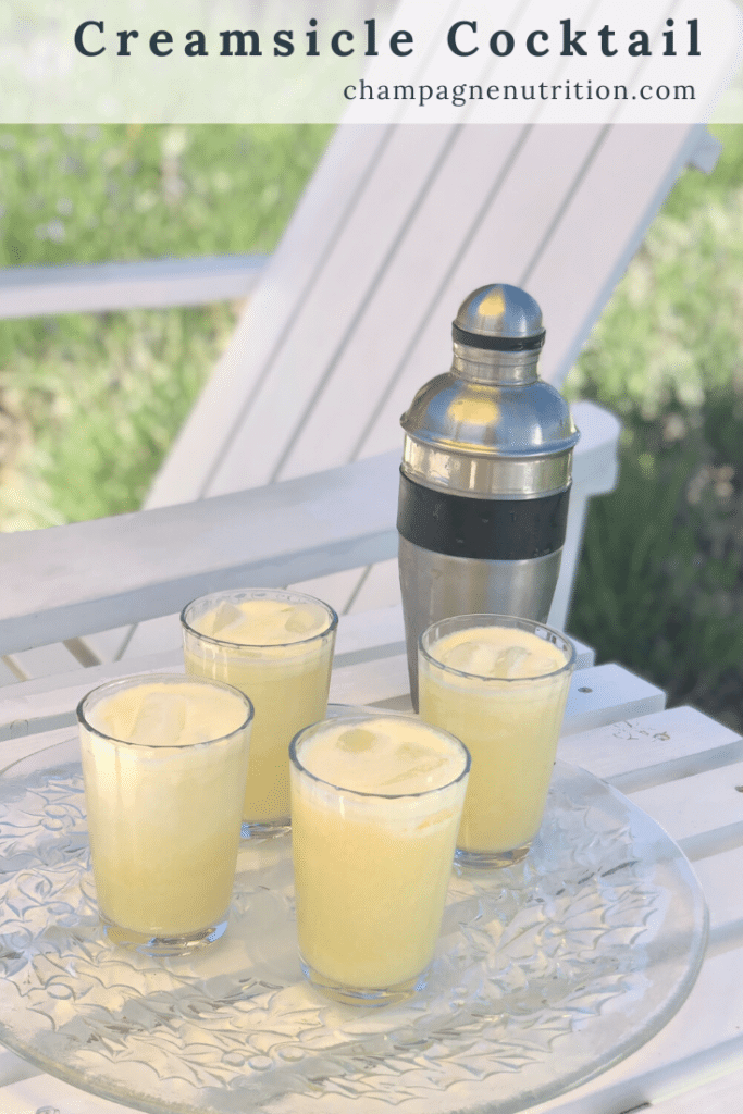 creamy orange cocktails by the pool