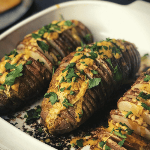 Hasselback Potatoes with Cheesy Vegan Sauce